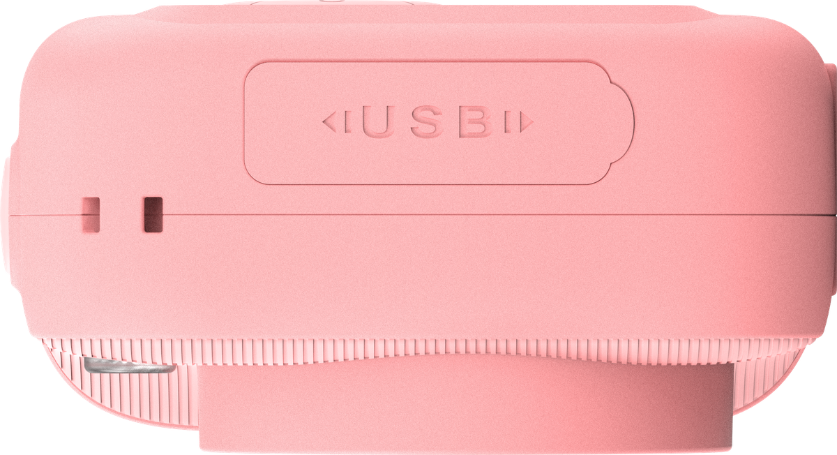 Side-panel detail view of a pink instant-print camera body, showing its USB port cover